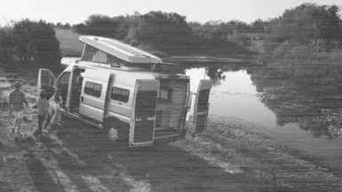 parked rv in greyscale