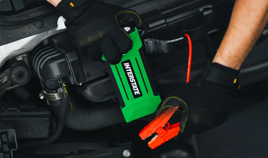 Jumping a car battery with an Interstate jump box